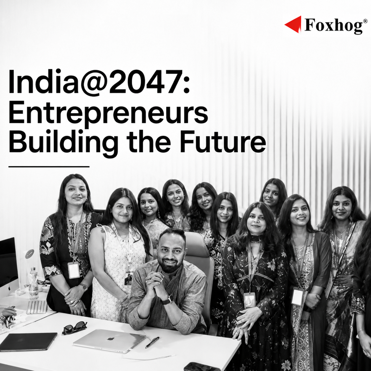 Group of diverse professionals posing in an office for India@2047: Entrepreneurs Building the Future (Foxhog logo in corner).