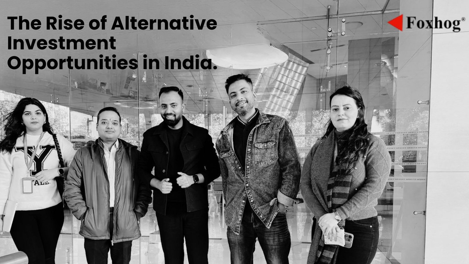 Five diverse professionals pose in a glass-walled lobby beneath a bold headline: The Rise of Alternative Investment Opportunities in India, with the Foxhog logo in the top-right corner.